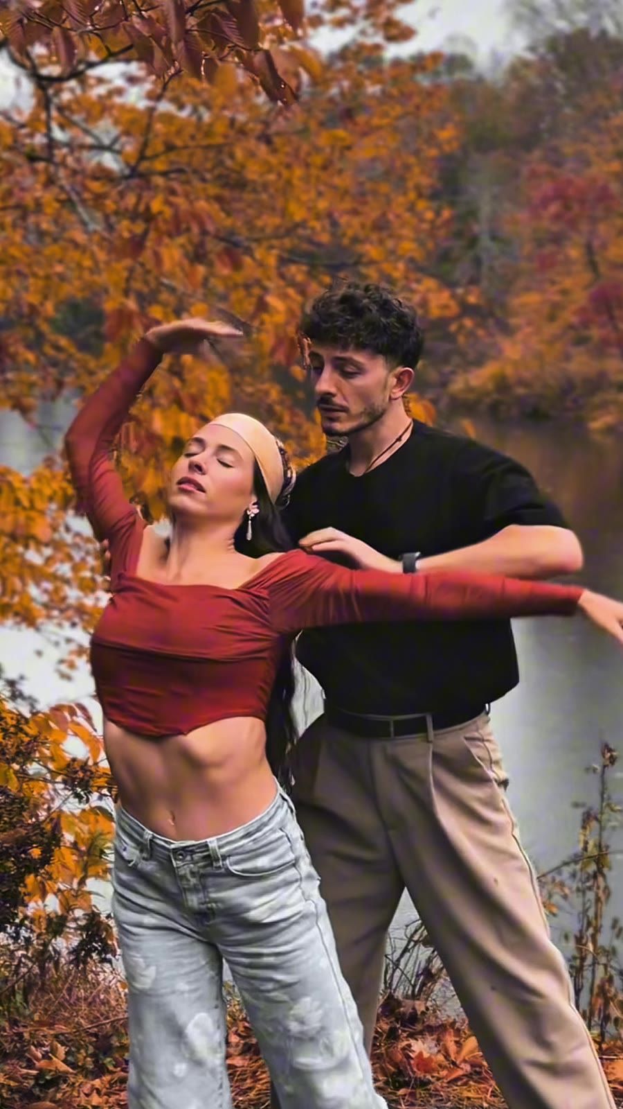 Michael dancing outdoors in autumn